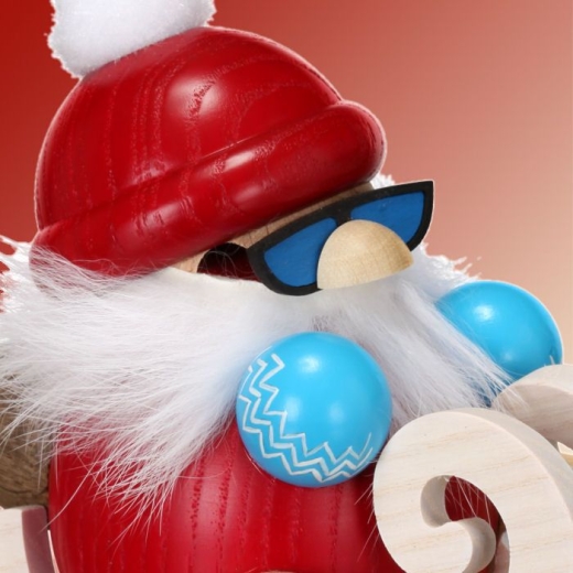 Kugelräuchermännchen Nikolaus fährt Schlitten